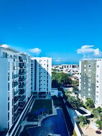 Modern buildings against blue sky