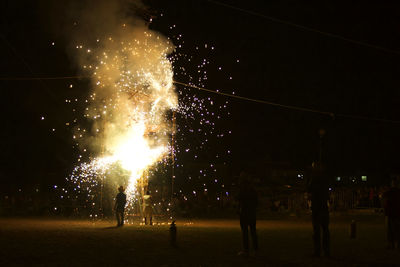 Firework display at night