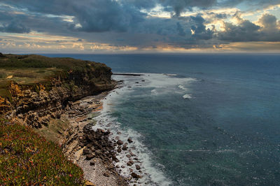 Scenic view of sea against sky during sunset