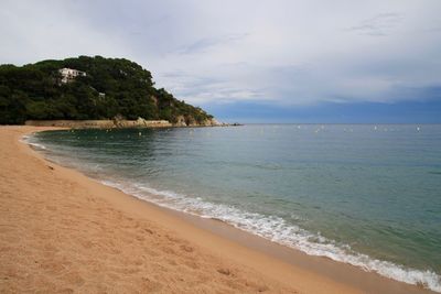 View of sea against cloudy sky