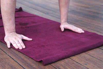Man doing yoga pose on the mat