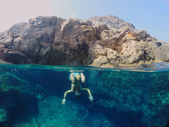 Man swimming in sea