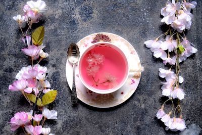 High angle view of pink roses on table