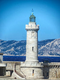 View of lighthouse against blue sky