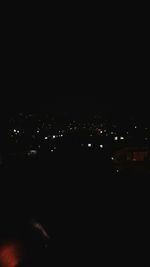 View of illuminated city at night