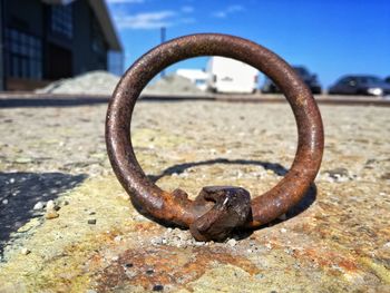 Close-up of rusty metal against wall