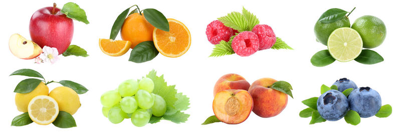 Close-up of chopped fruits against white background