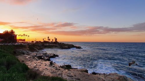 Scenic view of sea against sky during sunset