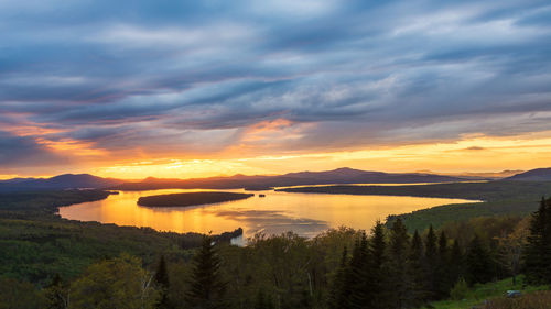 Scenic view of landscape against sky during sunset