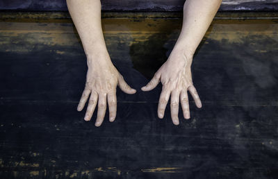 Low section of woman standing on floor