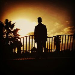 Silhouette people at sunset