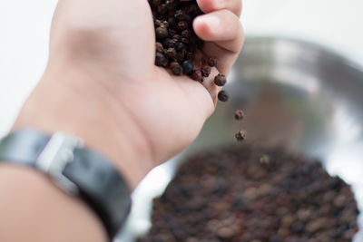 Close-up of person holding hands