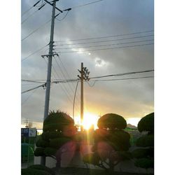 Electricity pylon at sunset