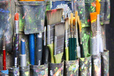 Close-up of multi colored pencils in row