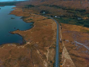 High angle view of road amidst field