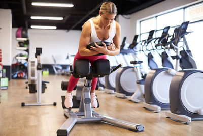 A woman working out in the gym.