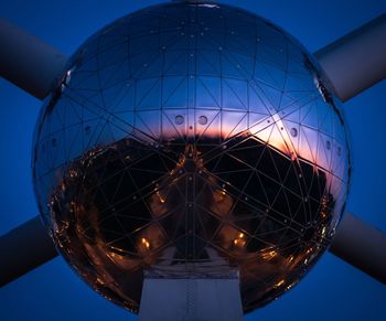 Low angle view of metallic ball reflection 