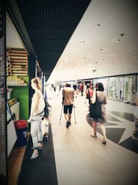 Women walking in corridor