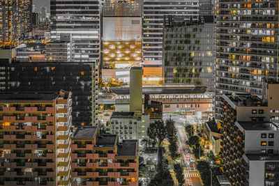 High angle view of street amidst buildings in city