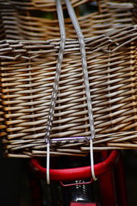 Close-up of chairs in wicker basket