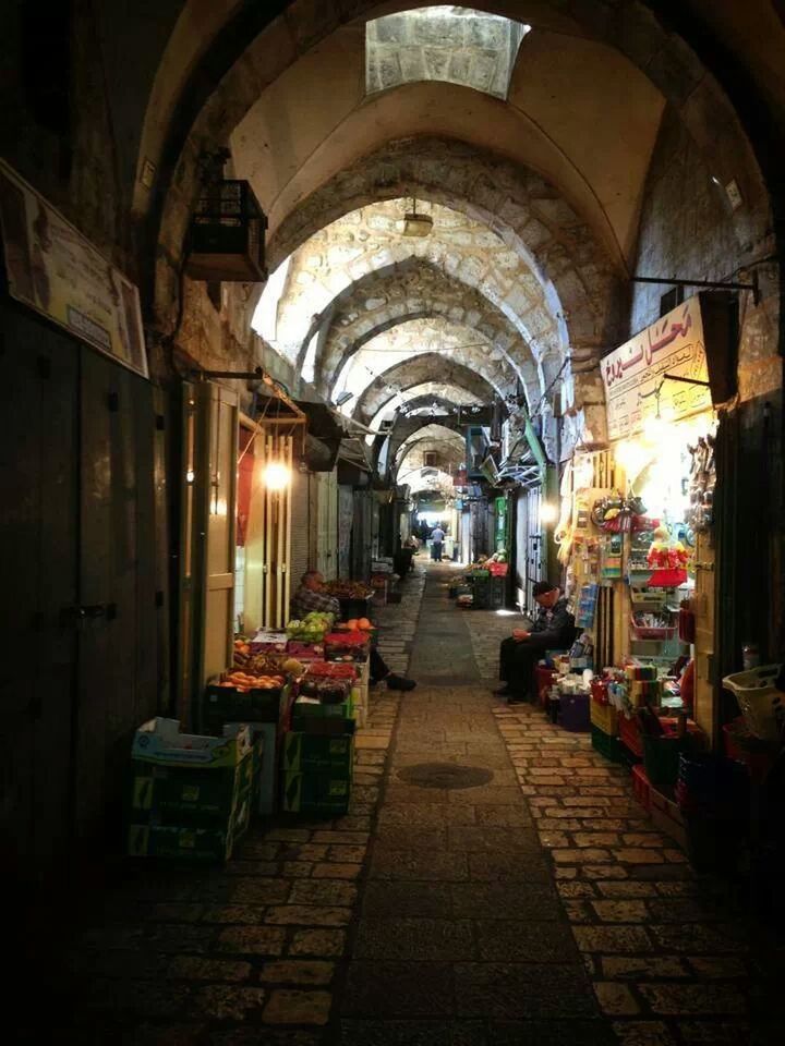 architecture, the way forward, built structure, illuminated, indoors, arch, lighting equipment, cobblestone, empty, corridor, diminishing perspective, building exterior, narrow, night, in a row, alley, walkway, absence, long, architectural column