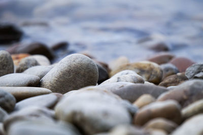 Close-up of stones on beach