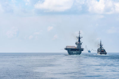 Ship in sea against sky