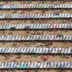 High angle view of tents at sandy beach