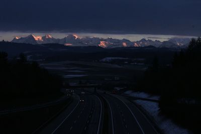 High angle view of railroad tracks against sky during sunset