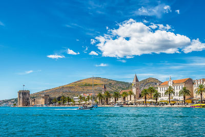 Scenic view of the old city of trogir in croatia against dramatic summer sky