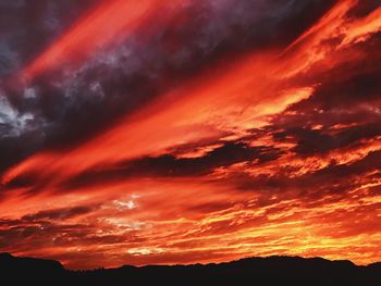 Scenic view of dramatic sky during sunset