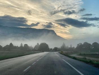 View of road against cloudy sky