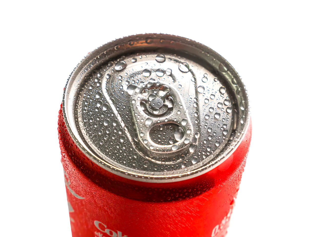 soft drink, drink can, drink, refreshment, can, aluminum can, soda, food and drink, cola, beer, alcohol, white background, metal, cut out, red, cold temperature, aluminum, cold drink, single object, tin can, close-up, studio shot, container, food, no people, indoors