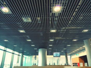 Low angle view of illuminated ceiling