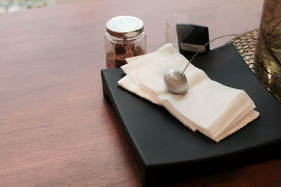 High angle view of tissue papers on table