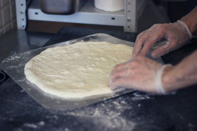Midsection of person preparing food