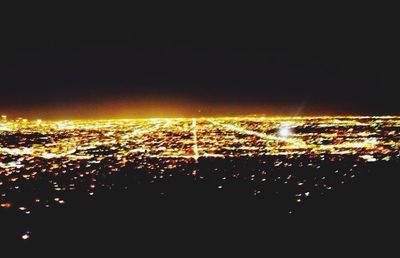 Aerial view of city at night