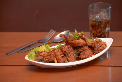 Close-up of food served on table