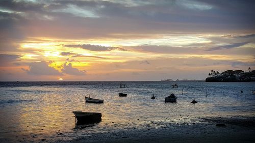 Scenic view of sea at sunset