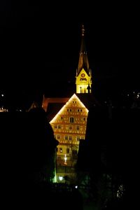 Illuminated buildings in city at night