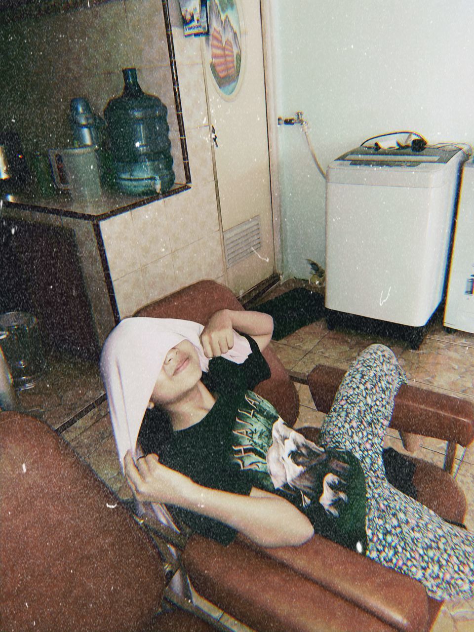 WOMAN WITH DOG RELAXING ON FLOOR