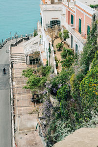 High angle view of old buildings against the sea