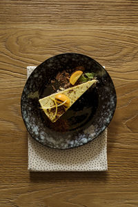 Directly above shot of ice cream in plate on table