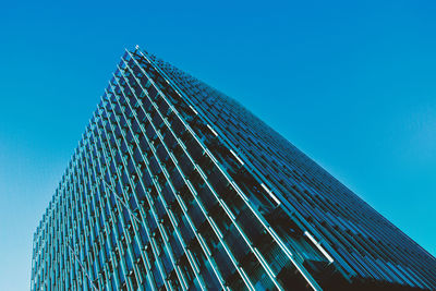 Low angle view of modern building against sky