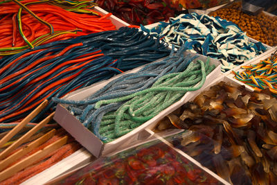 High angle view of multi colored food at market stall