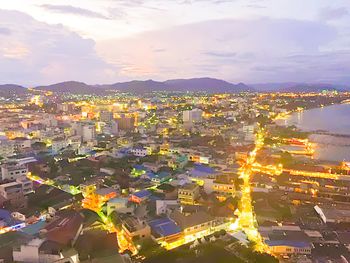 High angle view of illuminated buildings in city against sky