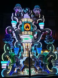 Low angle view of illuminated statue