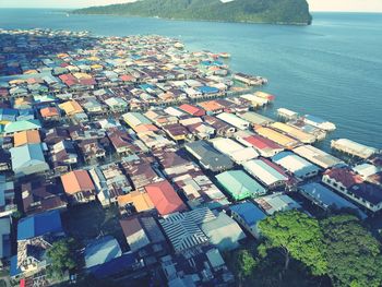 High angle view of cityscape by sea