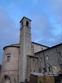 Low angle view of old building against sky