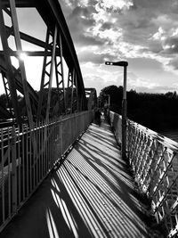 Footbridge against sky